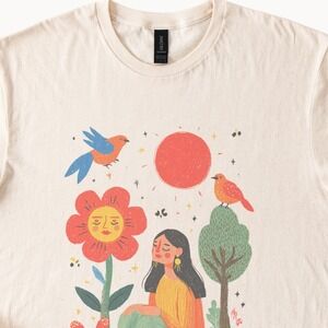 Whimsical Garden Girl Graphic Tee with Birds and Florals